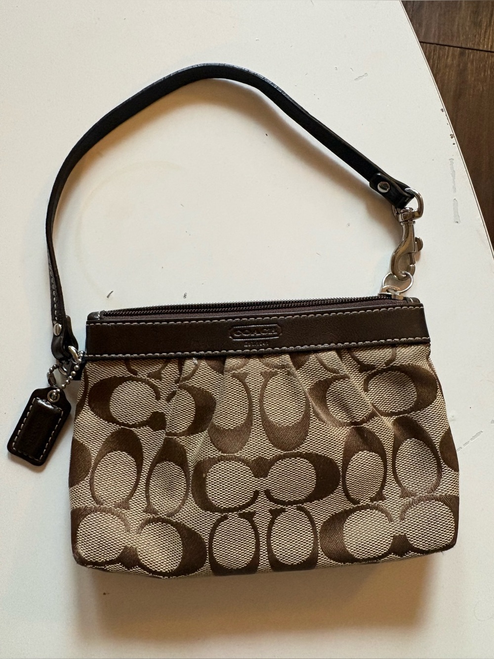 Coach Signature Canvas Wristlet in Brown and Tan